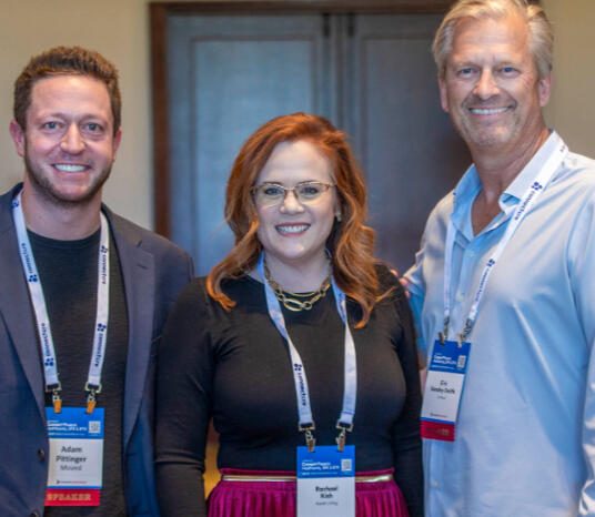 Eric Keosky-Smith with fellow speakers after moderating a commercial real estate multifamily panel